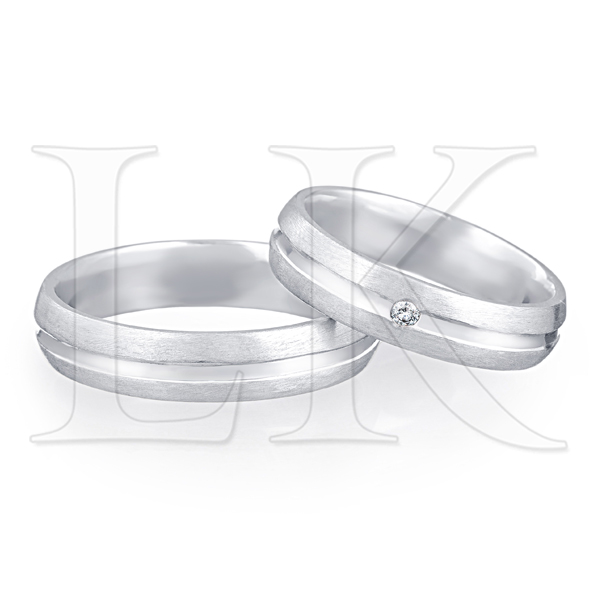Обручальные кольца из серебра с бриллиантом